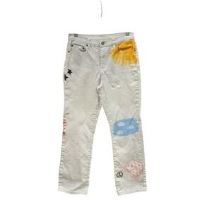 One of a kind hand-painted white denim jeans featuring a whimsical mix of sun